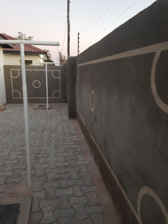 stand-alone-flat-with-laundry-room-and-paved-yard-big-1