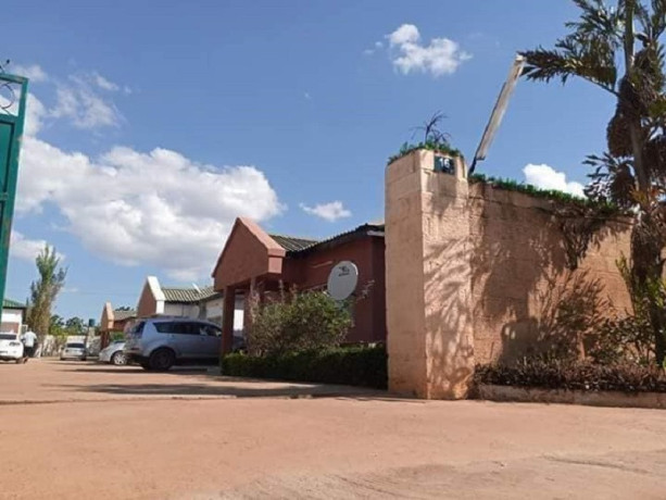 complex-of-4-by-2-bedroom-flats-for-sale-in-chalala-big-2